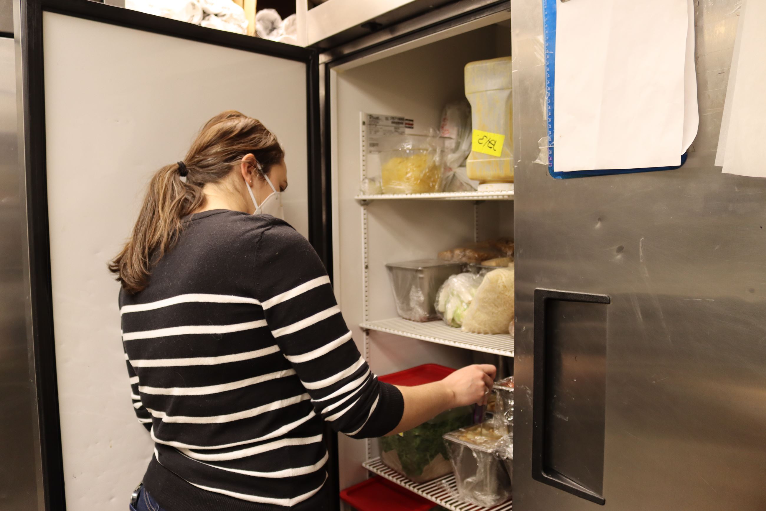 image of women completing food inspection 
