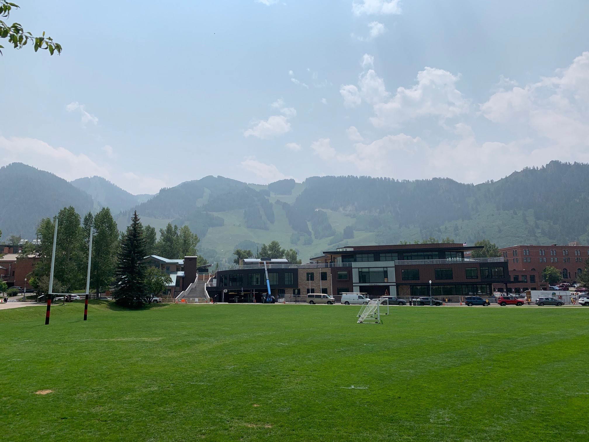 image of aspen mountain with hazy skis from wildfire smoke in summertime 