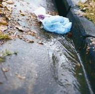 Plastic bags and other litter on a street