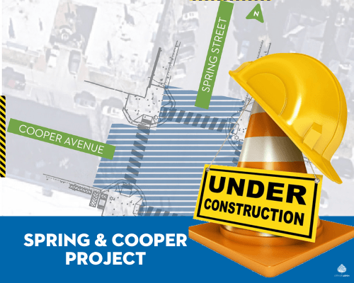 Image of Spring and Cooper Intersection with construction hat over it