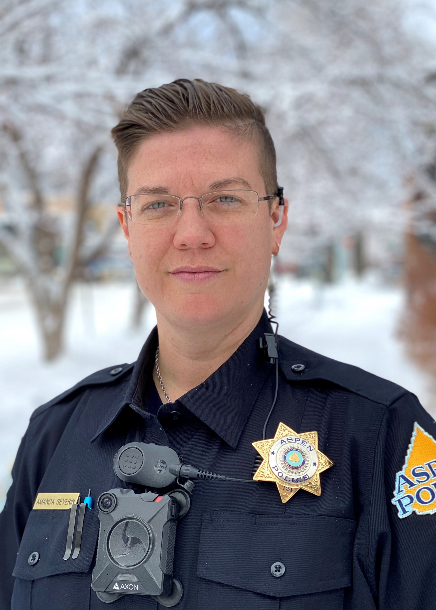 Female police officer in blue uniform